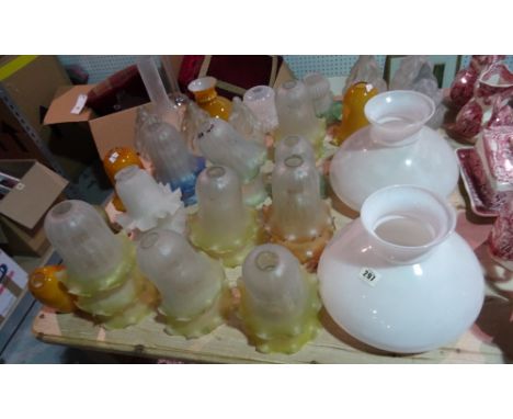 A quantity of glass lamp shades, including, frilled, flame and oil lamp examples, (qty). 