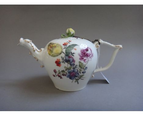A Meissen porcelain teapot, circa. 1760, foliate decorated with a basket weave moulded top and figural spout, blue crossed sw