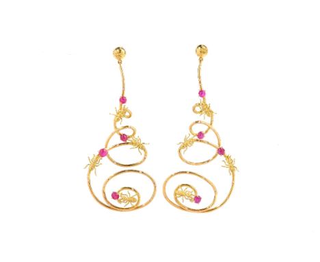 A pair of gold, cabochon ruby and diamond set pendant earrings, each of bold scrolling form, with insect motifs, claw set wit