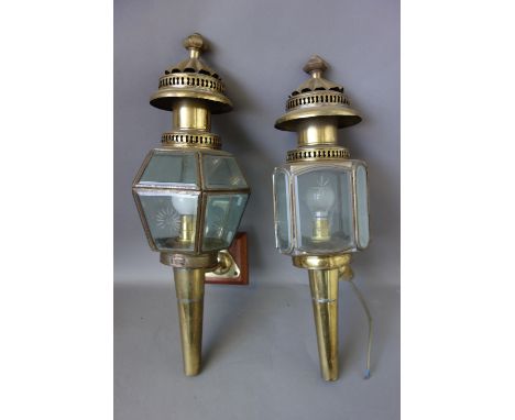 A pair of gilt metal and etched glass coaching lamps, with applied plaques for 'London Lamp Co', 53cm high, another similar p