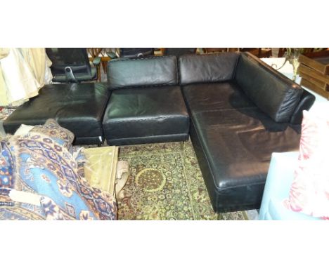 A 20th century black leather and chrome corner sofa, 176cm wide x 69cm high. 