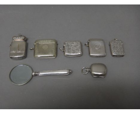 Three silver vesta cases, Birmingham 1900, Birmingham 1921 and Chester 1901, a plated vesta case with a crown finial, otherwi