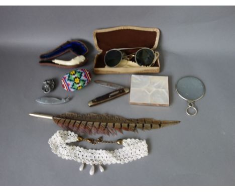 A quantity of small collectables, including; pocket knives, treen, lighters, compacts, a pipe, a silver cheroot holder and su