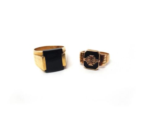 A gold and black onyx set rectangular signet style ring, ring size Y and a half and a gold and black onyx set ring, detailed 