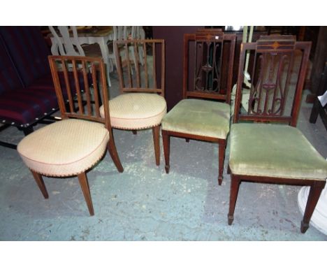 A pair of George III mahogany stick back dining chairs and a pair of Edwardian mahogany inlaid dining chairs with lyre splat 