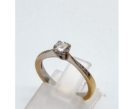 An 18K White Gold Solitaire Ring with BGI Certificate. 0.36ct. A5 -VS2 round brilliant natural diamond. Size K.3.16g total we