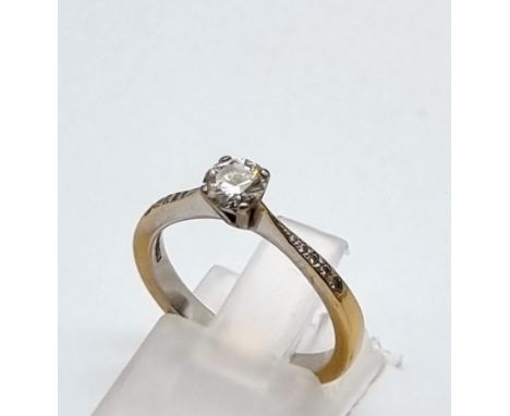 An 18K White Gold Solitaire Ring with BGI Certificate. 0.36ct. A5 -VS2 round brilliant natural diamond. Size K.3.16g total we