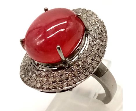 16ct Cabochon Ruby Gemstone Ring with .85ct of diamonds in a Pave Setting, set in 925 silver. Size P. 