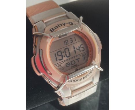 Vintage Casio BABY-G WRISTWATCH having apricot coloured strap and in full working order. 