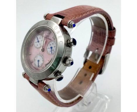 A Klaus Kobec Ladies Chronograph Watch. Leather strap. Case - 33mm. Pink dial with three sub dials. Quartz movement in workin