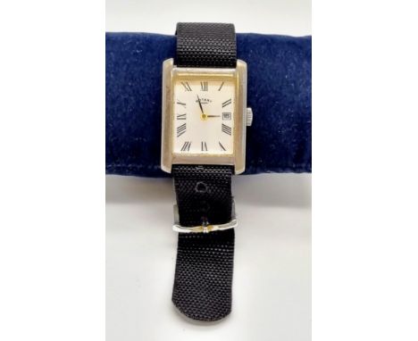 A Vintage Rotary 925 Silver Tank Watch. Black cloth strap. Square silver case - 32 x 25mm. White dial with date window. Quart