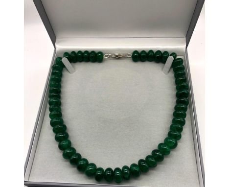 A Rondelle Bead Green Jade Single Strand Necklace. 14mm beads. 50cm length. Comes in a presentation case. 