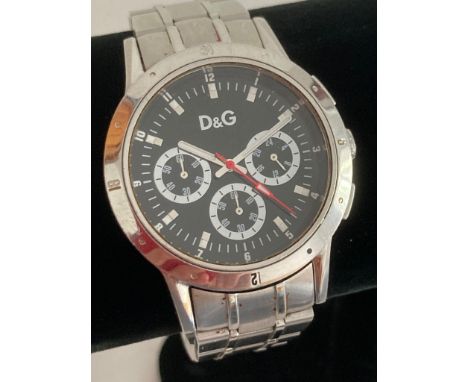 Gentlemans Quartz D&amp;G Chronograph, Multi dial black face model having sweeping red second hand. Silver tone with stainles