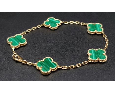 A Van Cleef and Arpels 18K Rose Gold Malachite Alhambra Bracelet. Faithful to the very first Alhambra jewel created in 1968, 