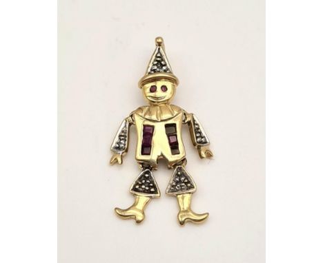 A 9K yellow gold diamond and ruby clown pendant. Height: 30 mm, weight: 2 g. 