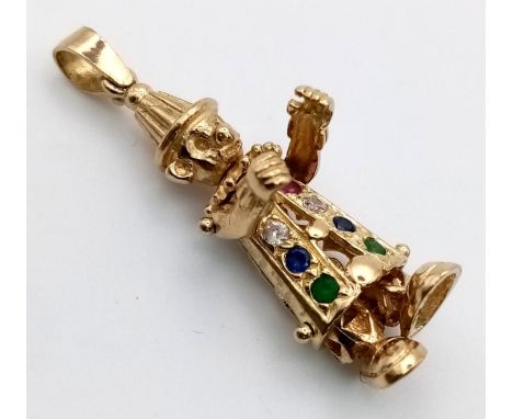 A 9 K yellow gold cute clown pendant/charm set with precious stones. Height: 30 mm, weight: 3.8 g. 