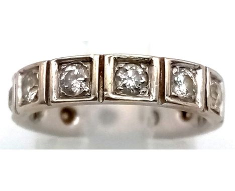 An 18K White Gold Eternity Diamond Ring. 0.48ct of round cut diamonds. Size K. 4.7g total weight. Ref: 