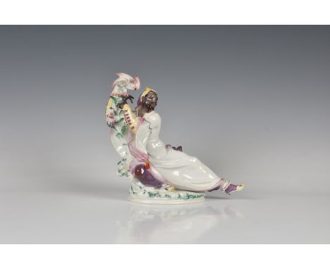 Paul Scheurich (1883-1945) for Meissen - Gentleman figure with cockatoo modelled 1922, male reclining with his left leg outst