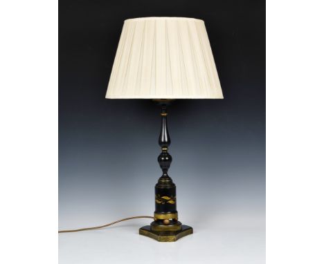 A toleware style black &amp; gilt painted wooden table lamp 22in. (56cm.) high without fittings.* Condition: Not tested.