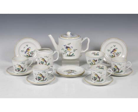 A Spode Queen's Bird pattern tea service for four pattern no. Y-4973-Z, comprising a teapot and cream jug, both with interlac