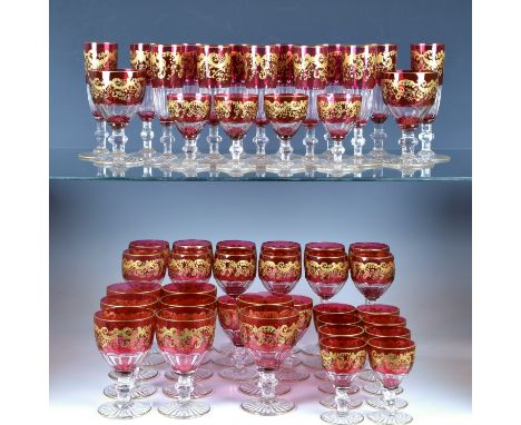 A fine and extensive part suite of St Louis Trianon Gold pattern drinking glasses the cranberry flashed glasses with panel cu