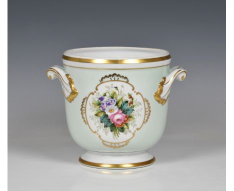 A Portuguese porcelain Sevres style jardinière of urn form reserved with panel, depicting floral spray, pale green ground, mo