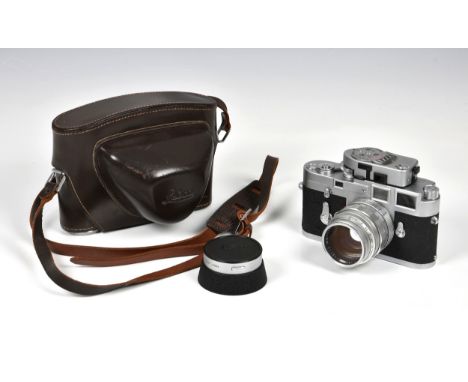 A Leica M3 Rangefinder Camera c.1960, serial no. 1071405, with an Elmar f/1.4 50mm lens, no. 1788223, with UV.a filter, 1251G