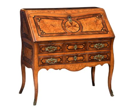 A late 18th century Maltese marquetry bureau the drop leaf forming a writing desk when opened and having a central marquetry 