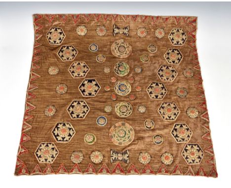 An Eastern embroidered silk and metal thread panel probably Indian, mid-20th century using earlier elements, the square panel