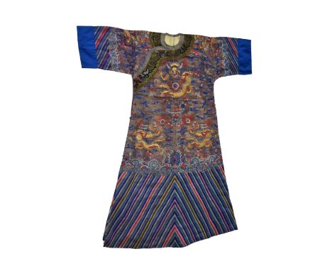 A Chinese blue ground silk gauze dragon robe probably first half 20th century, the blue gauze with a pale gold backing, worke