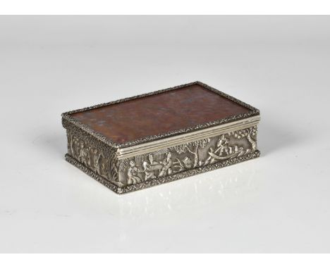 A polished hardstone and white metal snuff box in an oriental style unmarked, of rectangular form, the hinged cover, having f