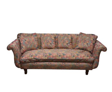 A Victorian style scroll arm sofa on turned wooden supports, 86¼ x 38in. (219 x 96.5cm.), 33in. (83.8cm.) high.* Condition: M