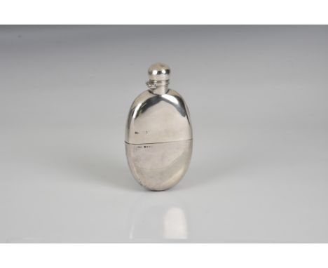 A Victorian silver pocket spirit flask Army &amp; Navy Co-Operative Society Ltd., London 1888, oval form with detachable cup 