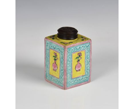 A Chinese rose-jaune square tea caddy late 19th / early 20th century, in yellow and turquoise, the rectangular reserves with 