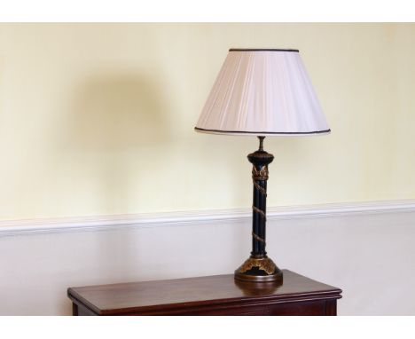 A black and parcel gilt cluster column pottery lamp late 20th century, in the Regency style, with pleated silk shade, 19in. (