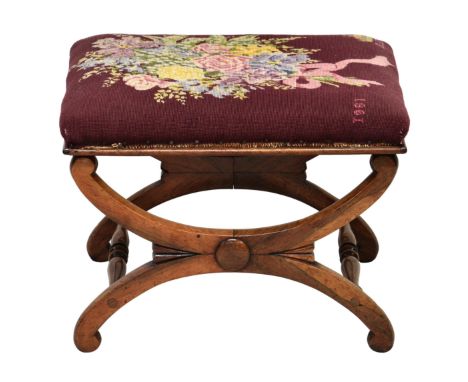 A Regency rosewood  foot stool with tapestry seat the cross frame supports with turned stretchers, the seat embroidered with 