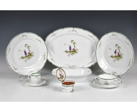 A modern A. Raynaud &amp; Co porcelain "Si Kiang" pattern Limoges part dinner service with moulded basket weave wide rims wit