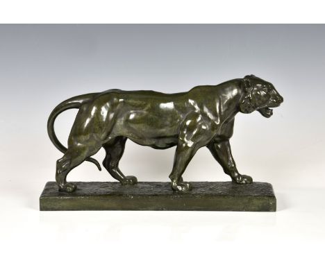 After Antoine-Louis Barye (France, 1795-1875) unmarked, probably first half 20th century, 'The Walking Tiger', mid-green pati