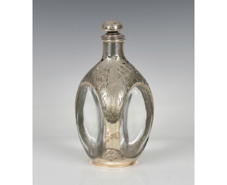 An Oriental silver mounted three sided decanter or large scent flask the pierced silver surround decorated with bamboo, domed