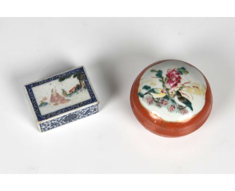 A Chinese porcelain famille rose, coral ground rouge pot 19th century, of bun form, the cover with a reserve painted with a p