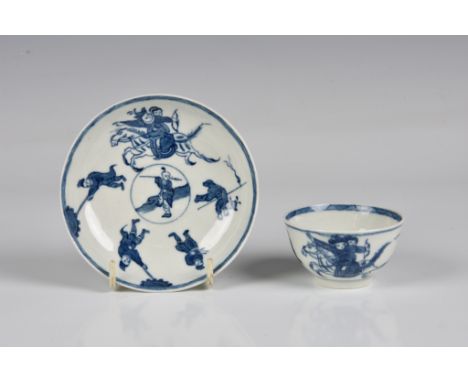 A first period Worcester porcelain tea bowl and saucer in the Eloping Bride pattern circa 1765, painted in underglaze blue wi