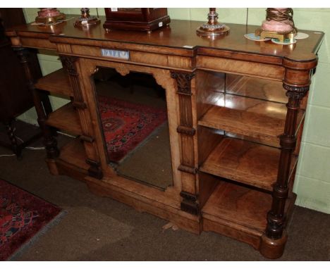 A Victorian figured walnut breakfront credenza, mirrored central door flanked by shelves, with inset Jasperware Neoclassical 