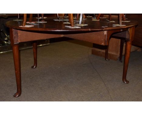 A George III mahogany dining table on pad feet, 175cm wide 