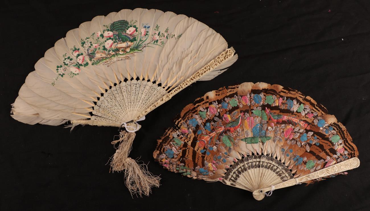 Two 19th century Chinese feather fans, comprising a fan with deeply ...