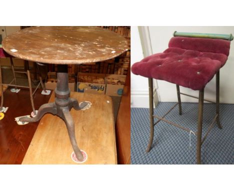 An 18th century oak circular tilt top tripod table and a brass stool with red button seat