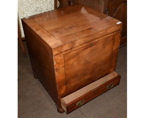 An 18th century oak chest, probably adapted from a commode, with brass solid plate side carrying handles, on pad feet
