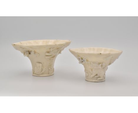 TWO CHINESE DEHUA ‘BLANC-DE-CHINE’ LIBATION CUPS, QING DYNASTY, KANGXI PERIOD, 1662 – 1722清 康熙 德化仿犀角杯一對 兩隻The larger with app
