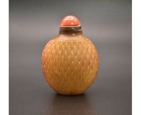 A CHINESE JADE ‘BASKET WEAVE’ SNUFF BOTTLE, QING DYNASTY清 黃玉刻編織紋鼻煙壺The stone of yellowish-brown tone, carved overall with the