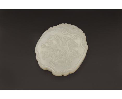 A CHINESE WHITE JADE ‘DRAGON’ PENDANT, QING DYNASTY, LATE 19TH CENTURY清 白玉雕龍掛件 十九世紀晚期Carved to one side with a dragon chasing