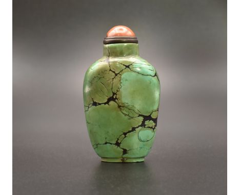 A CHINESE TURQUOISE MATRIX SNUFF BOTTLE, QING DYNASTY清 綠松石鼻煙壺Of flattened shouldered form, the stone of bluish/green tones ag